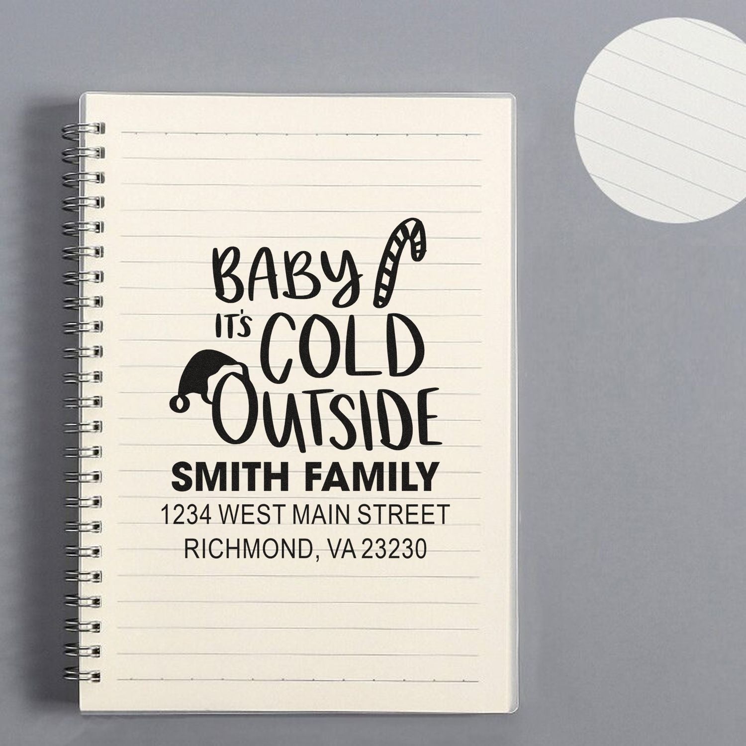Personalized rubber stamp design with Baby Its Cold Outside and Smith family return address for holiday mail.