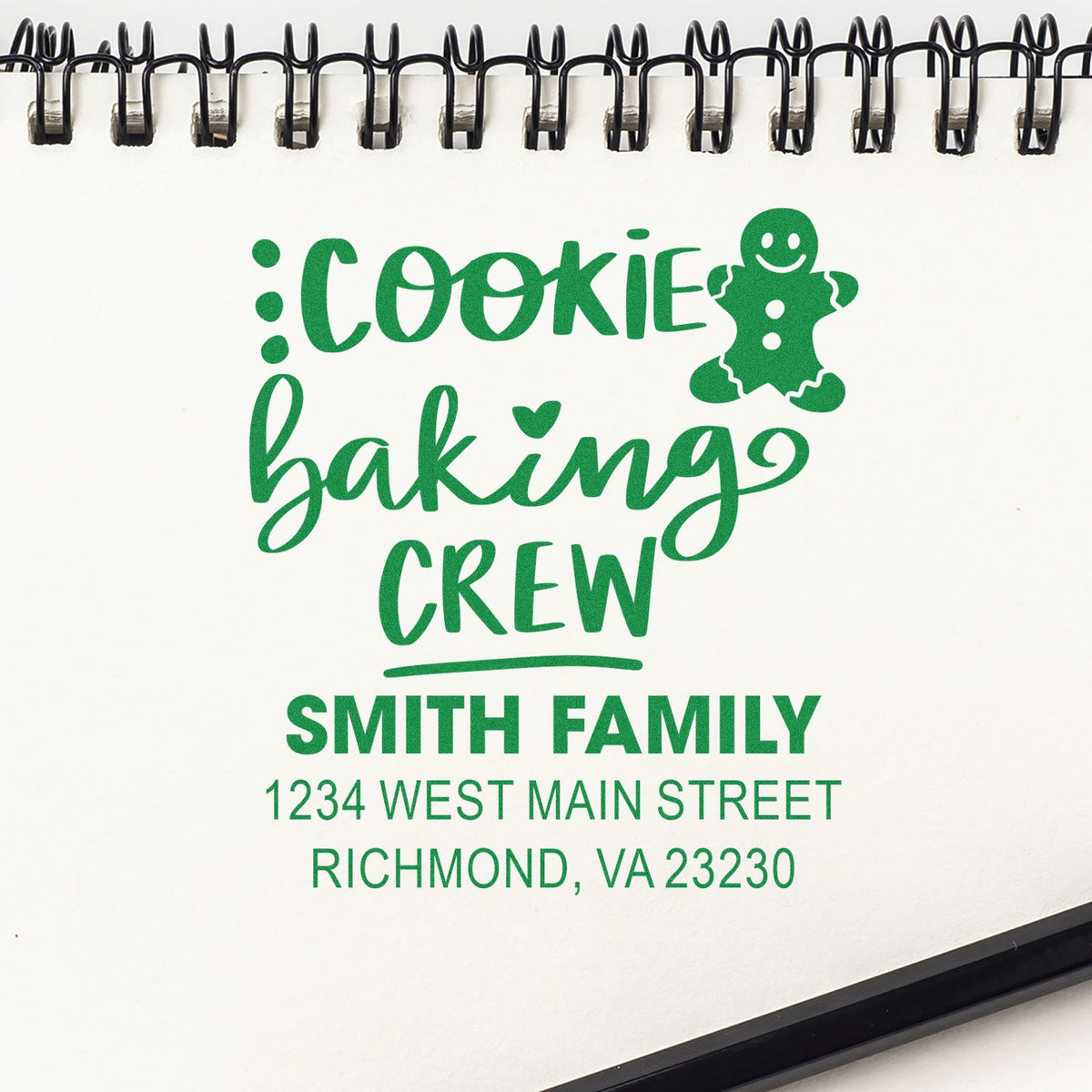 Custom cookie baking crew rubber stamp design for Smith family with gingerbread man and address in green.
