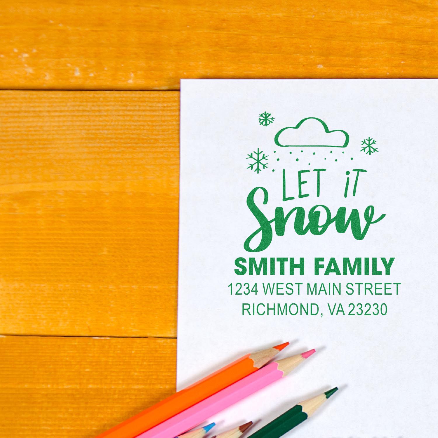 Personalized holiday return address rubber stamp with Let It Snow design for Smith family Christmas cards.