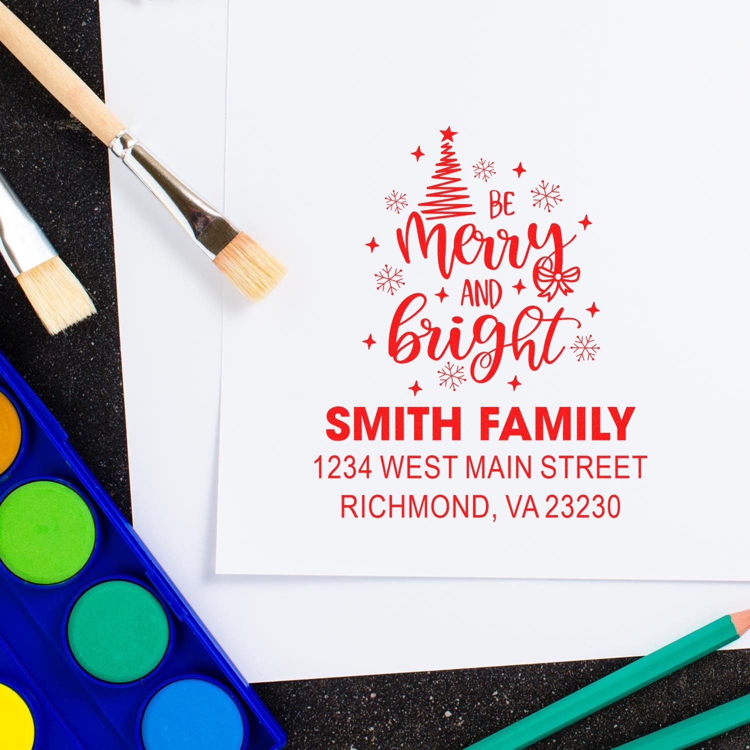 Custom holiday rubber stamp sample with Be Merry and Bright Christmas design and Smith family return address.