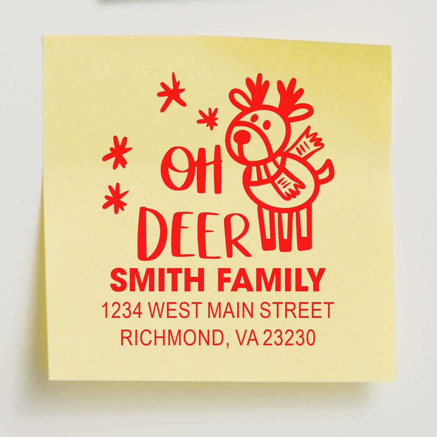 Personalized rubber stamp imprint with Oh Deer holiday design, Smith family name, and return address for mailing.