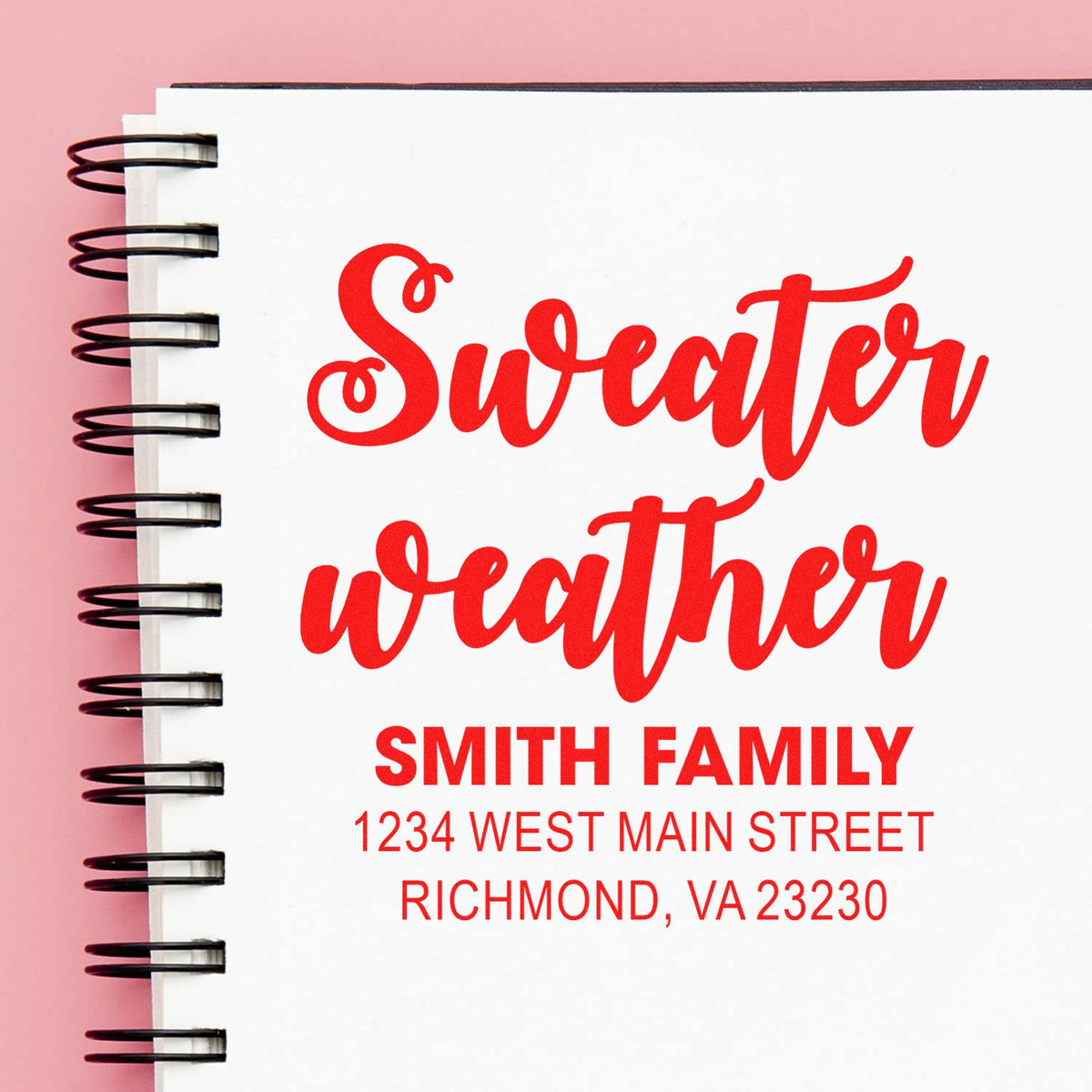 Custom address rubber stamp mockup with Sweater Weather script and Smith family address for personalized stationery.