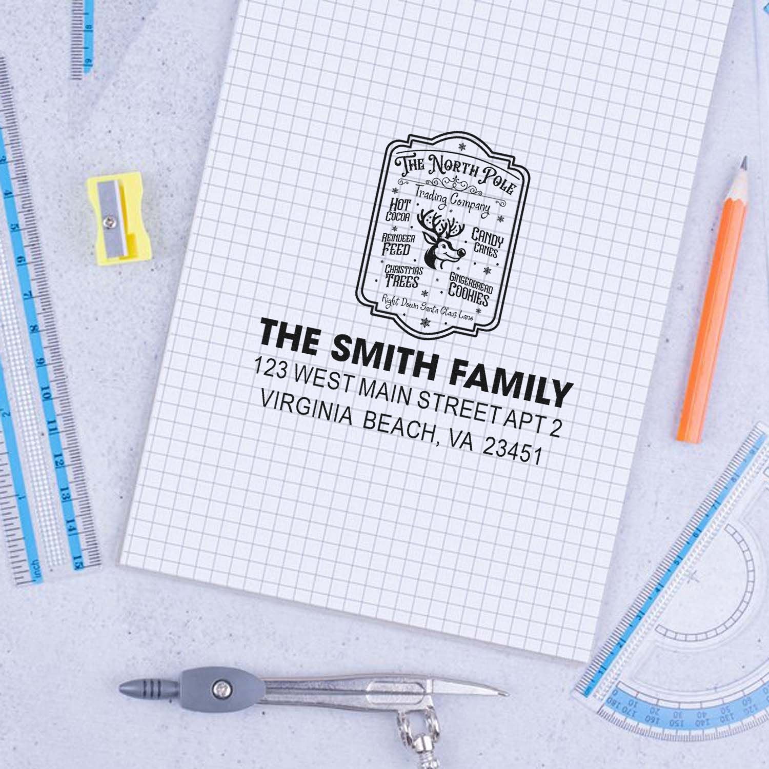 Custom Christmas return address rubber stamp mockup featuring The Smith Family and North Pole holiday design.