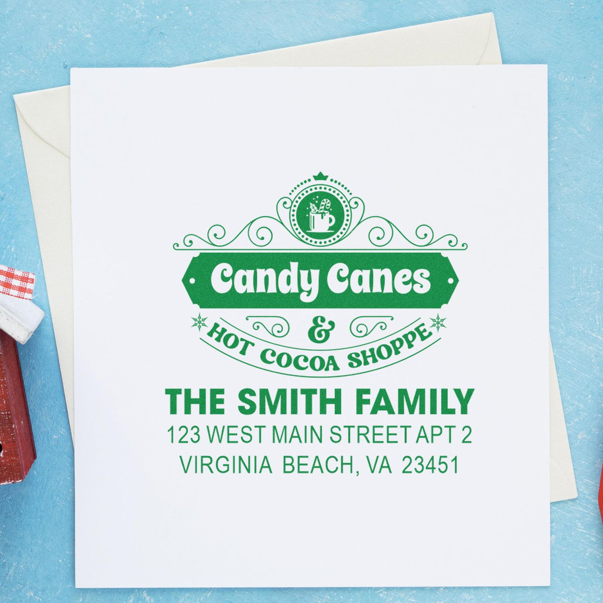 Custom rubber stamp design for holiday cards with candy canes and hot cocoa shoppe return address for The Smith Family.