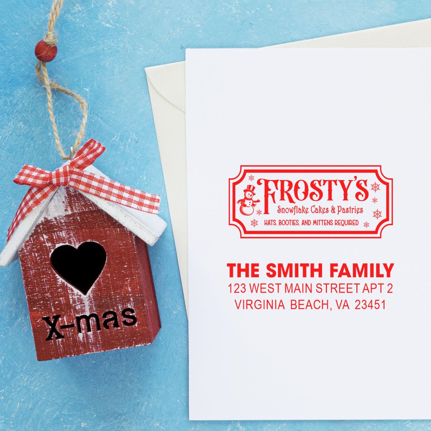 Custom holiday return address rubber stamp for Christmas cards, featuring Frostys logo and The Smith Family address.