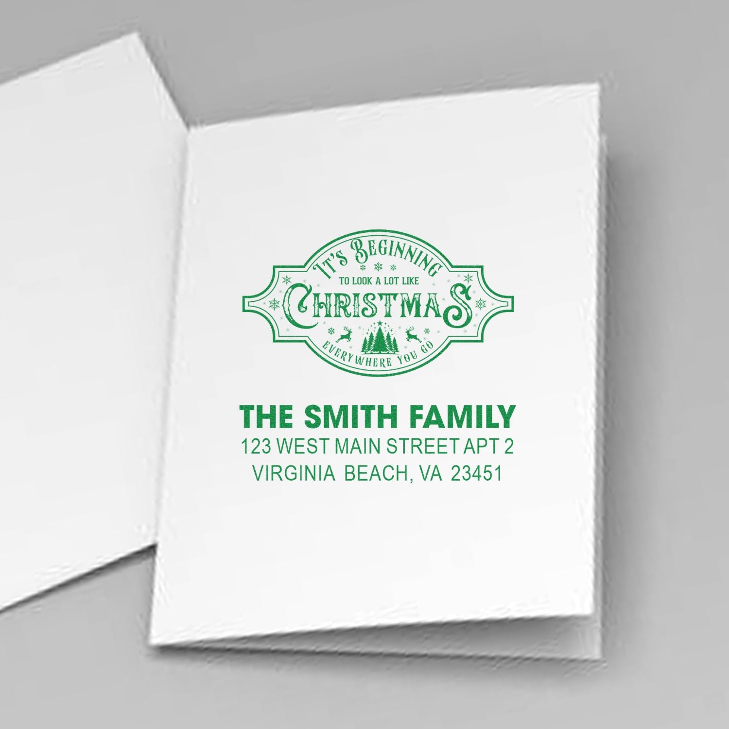 Custom Christmas address rubber stamp for The Smith Family, featuring holiday greeting and Virginia Beach return address.