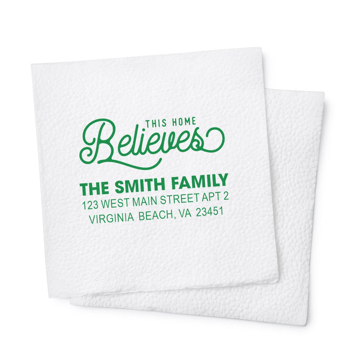 Custom rubber stamp with This Home Believes message, Smith family name, and address for personalized home stationery.