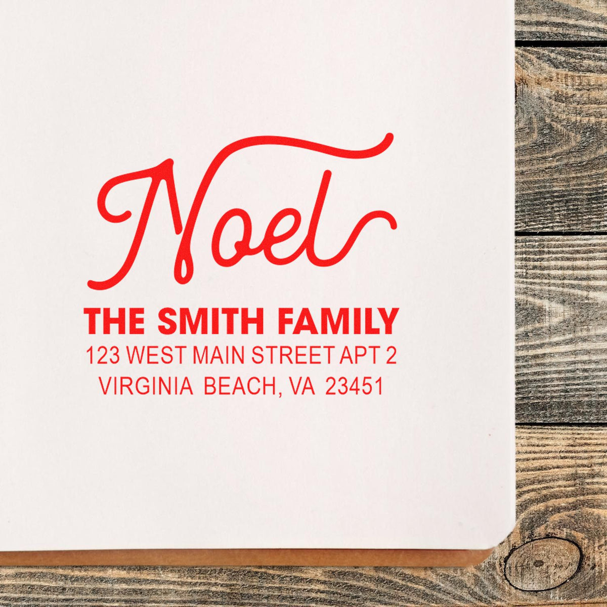 Personalized Noel return address rubber stamp with The Smith Family name and Virginia Beach, VA address in red.