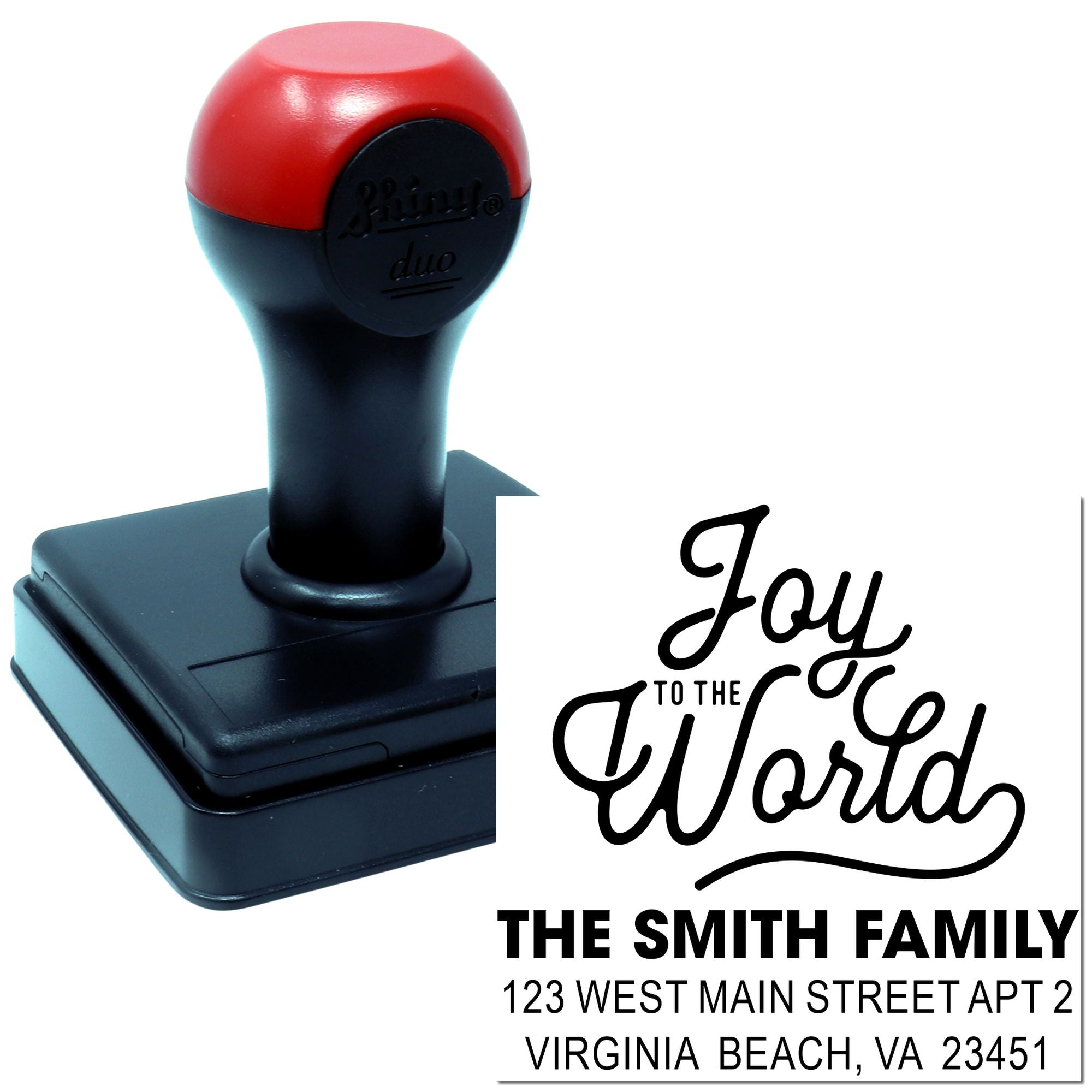 Custom self-inking rubber stamp for holiday cards with Joy to the World personalized family return address.