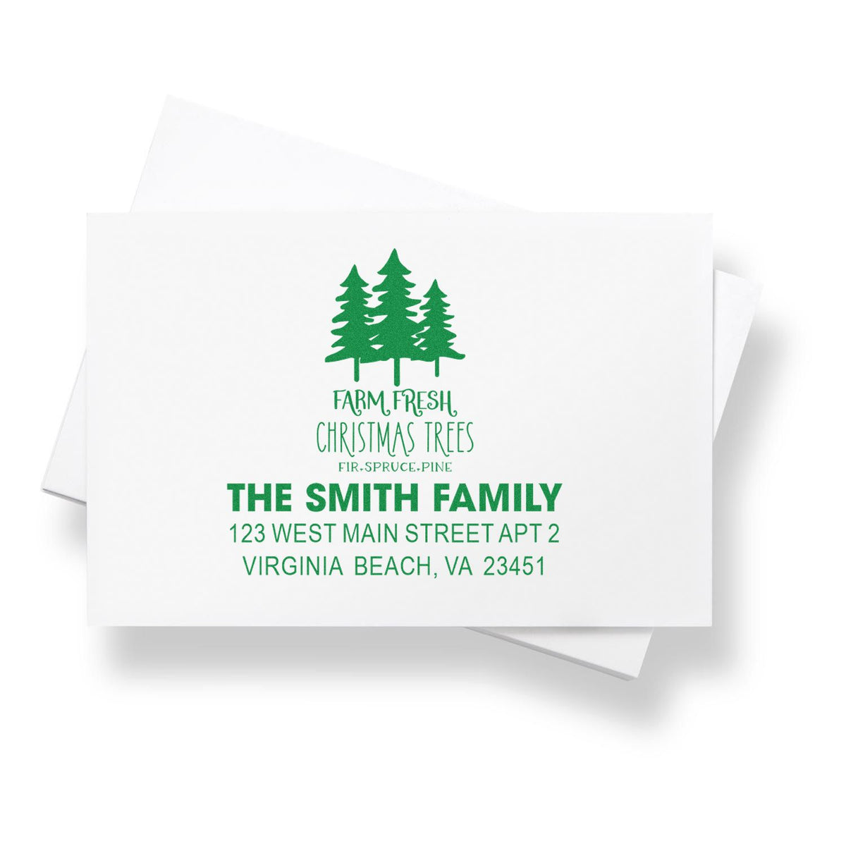 Custom Christmas tree return address rubber stamp with family name for holiday cards, envelopes, and festive mail.