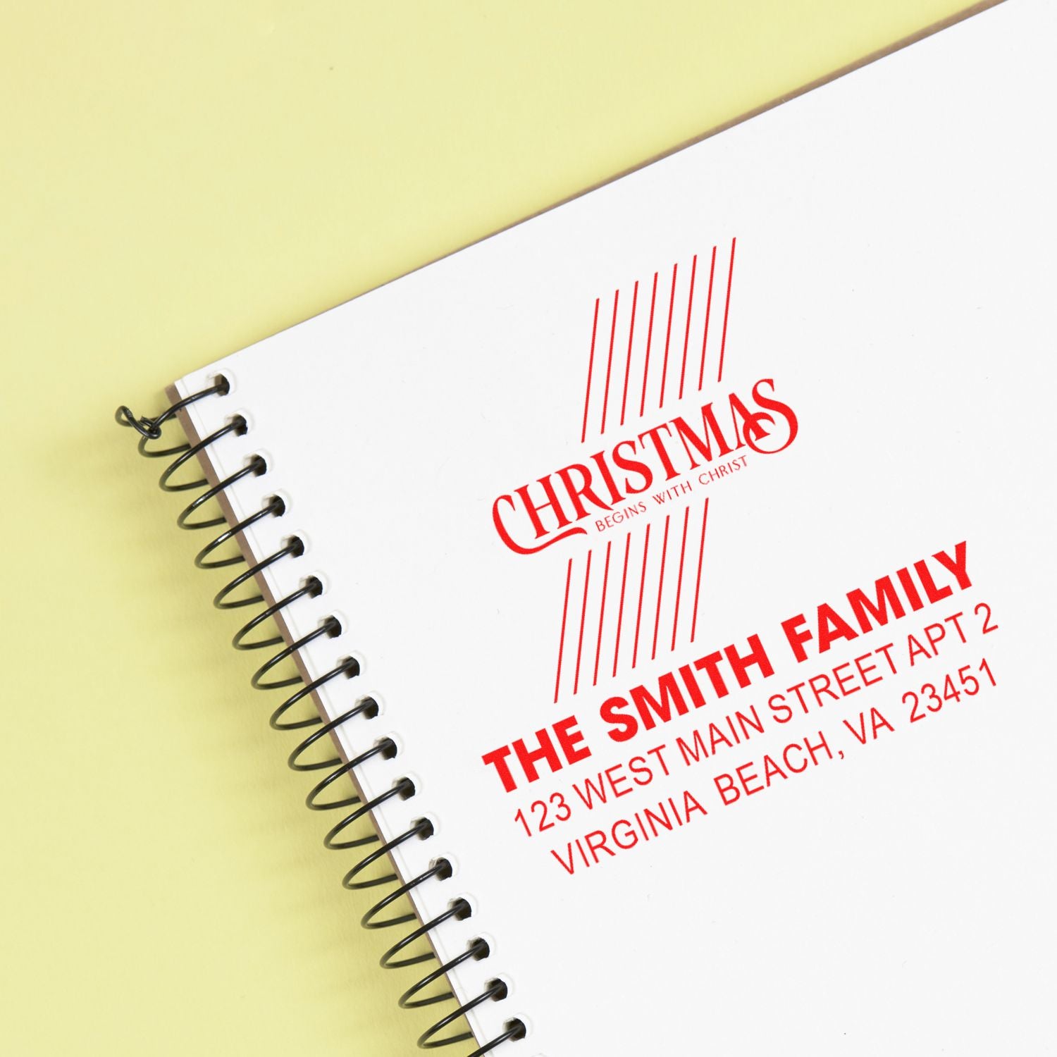 Personalized Christmas address rubber stamp for family stationery, with holiday greeting and return address.