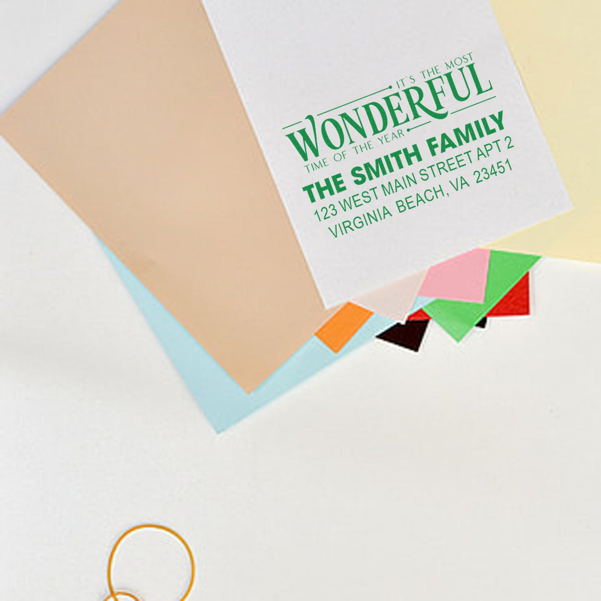 Custom holiday rubber stamp for envelopes with family name and address, featuring Its the Most Wonderful Time of the Year design.