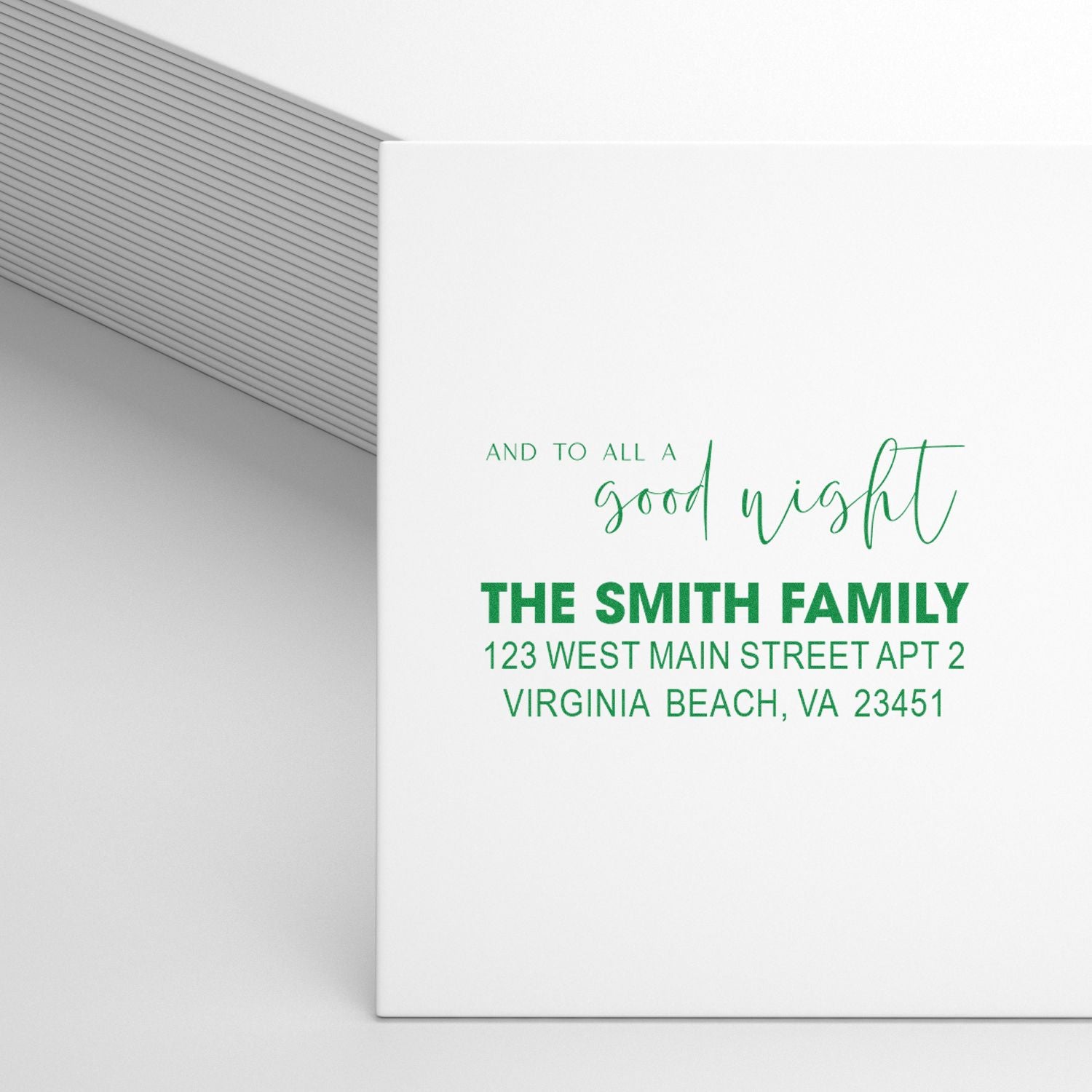 Custom rubber return address stamp for the Smith family with and to all a good night holiday envelope design.