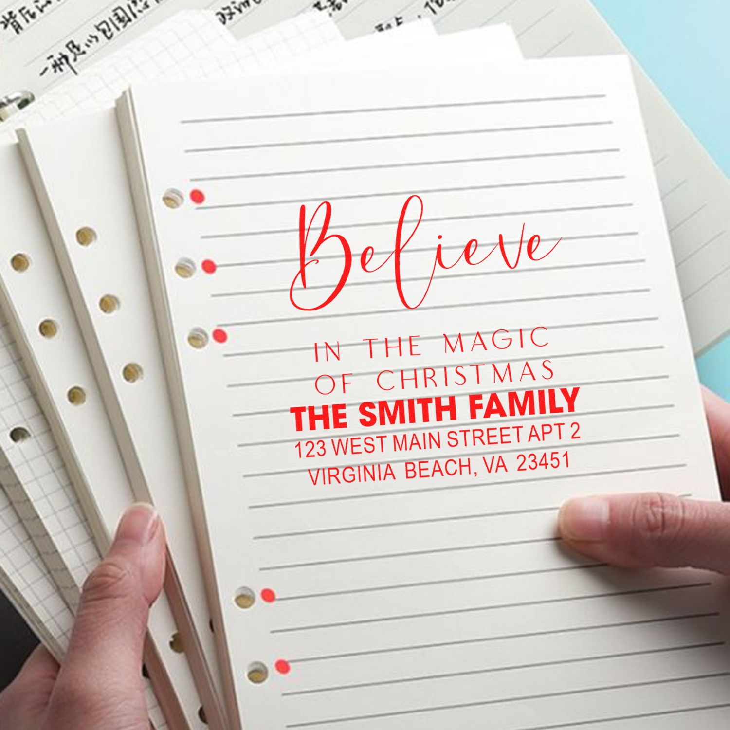Custom Christmas return address rubber stamp with festive Believe design for personalized holiday cards.