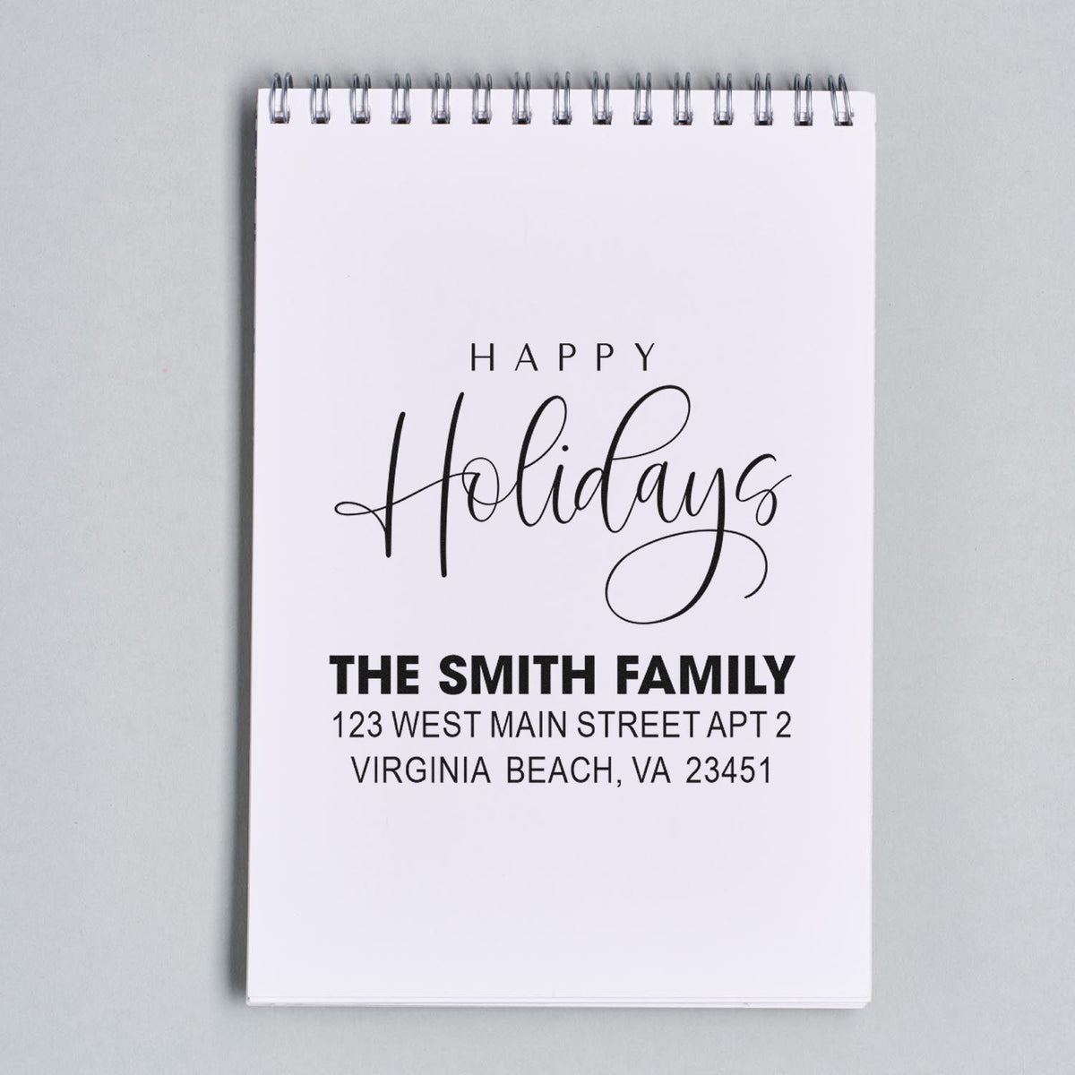 Custom Happy Holidays return address rubber stamp for The Smith Family, ideal for festive holiday cards and envelopes.