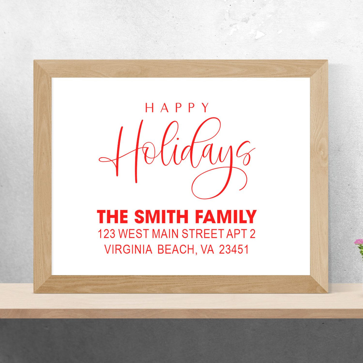 Personalized holiday rubber stamp design with Happy Holidays, Smith family name, and return address in red script.