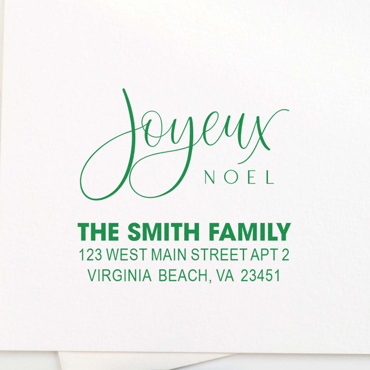Personalized Joyeux Noel rubber stamp with The Smith Family return address for Christmas cards and holiday mail.