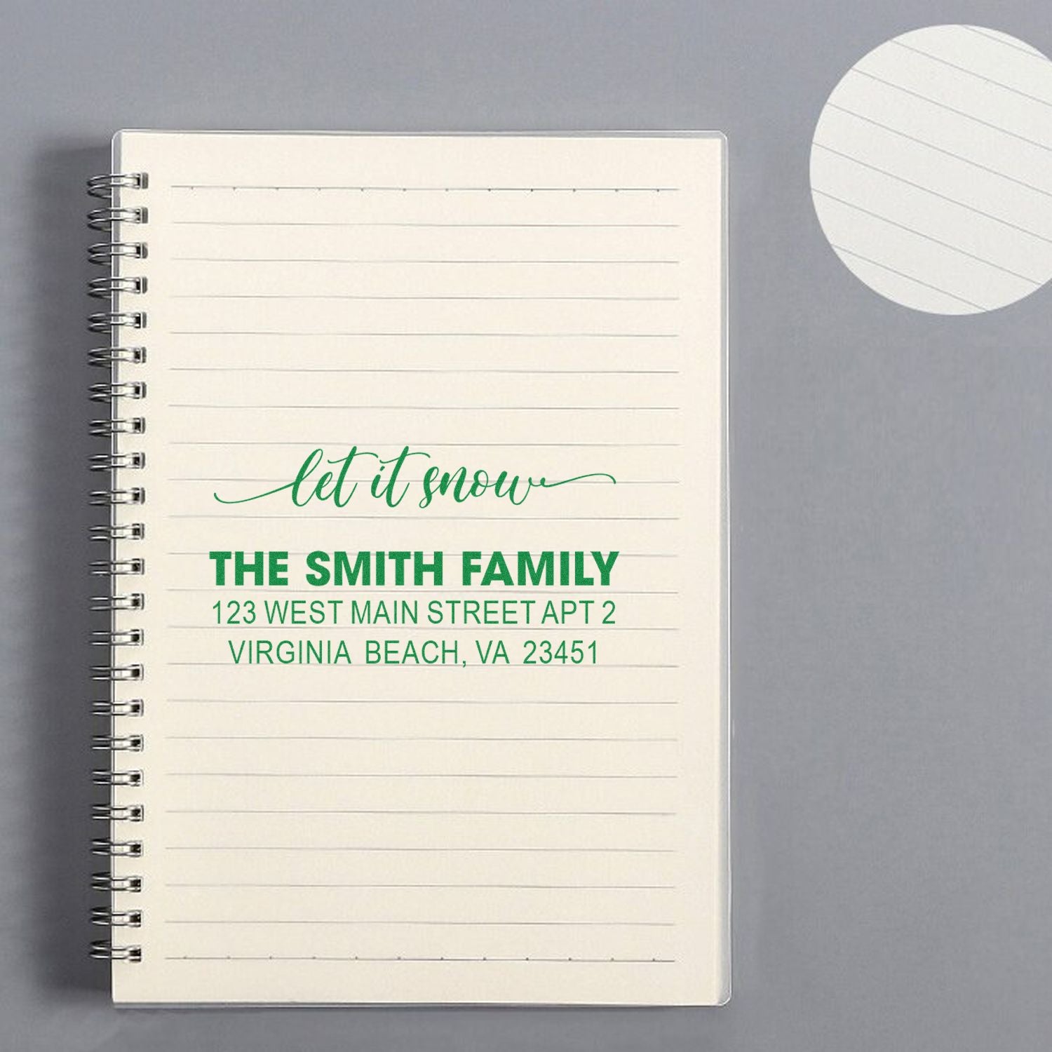Personalized rubber stamp with let it snow holiday design and return address for custom family mailing.