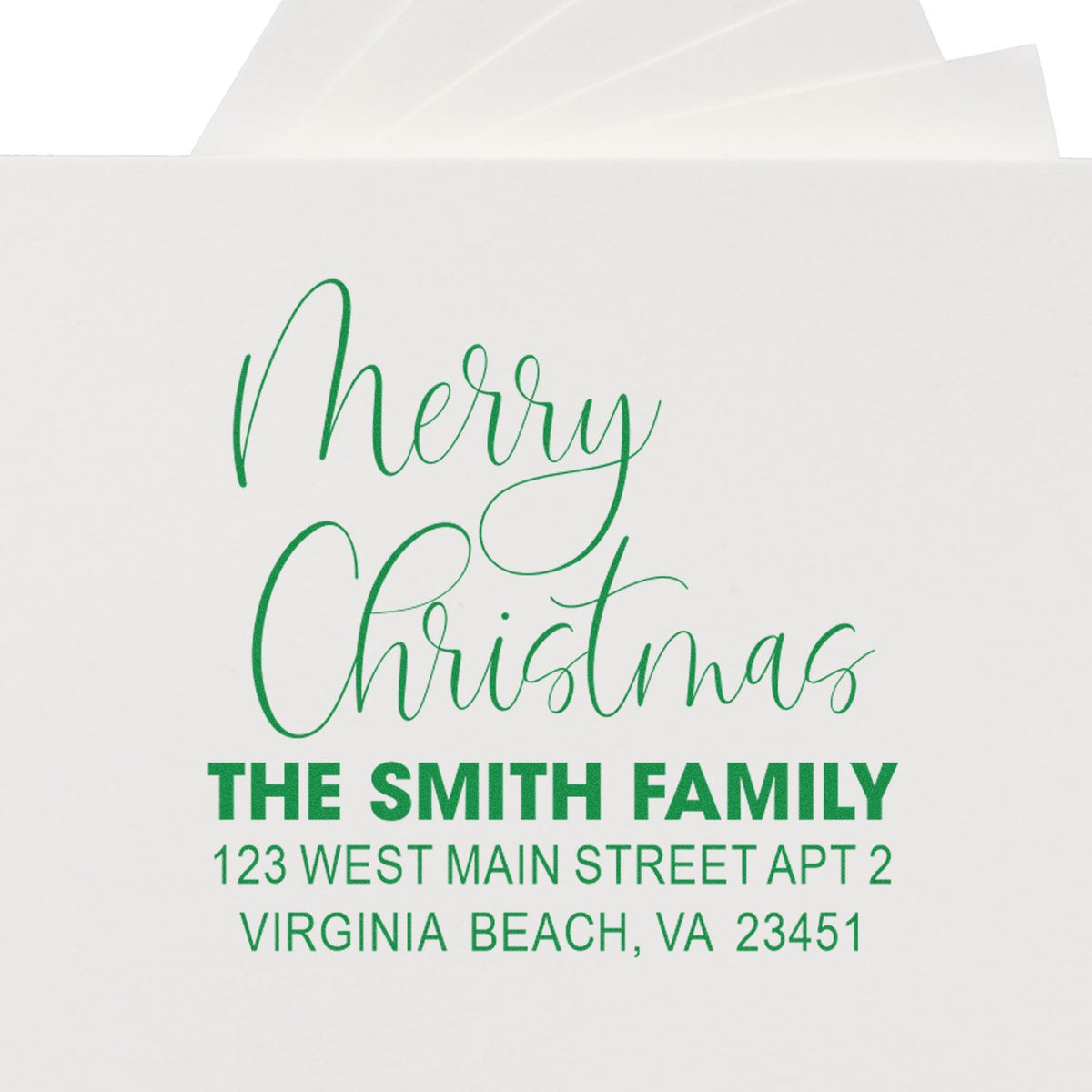 Custom Christmas return address rubber stamp for The Smith Family, 123 West Main St Apt 2, Virginia Beach, VA 23451.