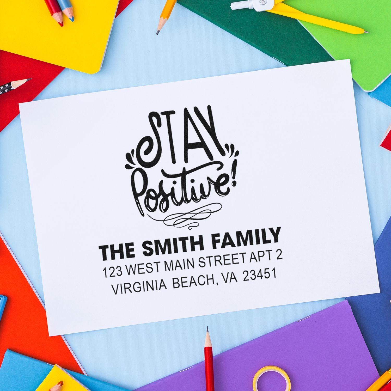 Custom return address rubber stamp with Stay Positive design for The Smith Familys personalized mail and stationery.
