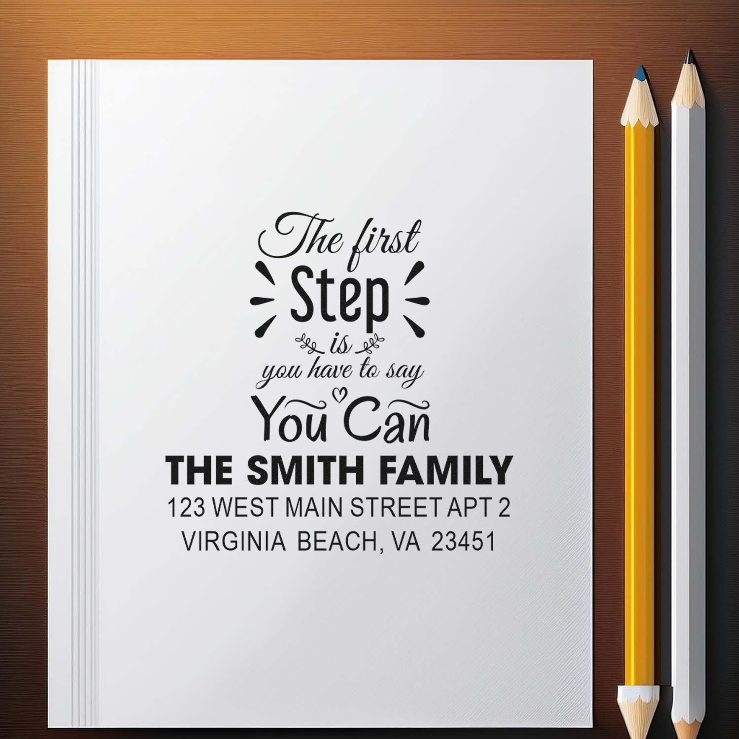 Personalized rubber stamp with motivational quote and family return address for custom stationery and envelopes.