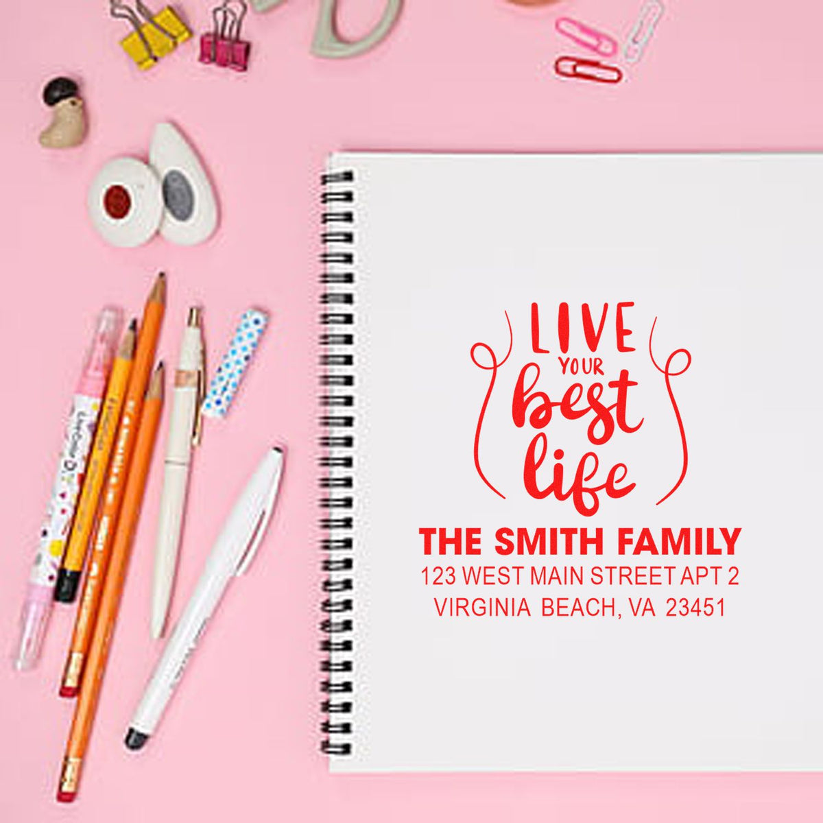 Custom rubber stamp with Live Your Best Life and The Smith Family return address for personalized stationery.