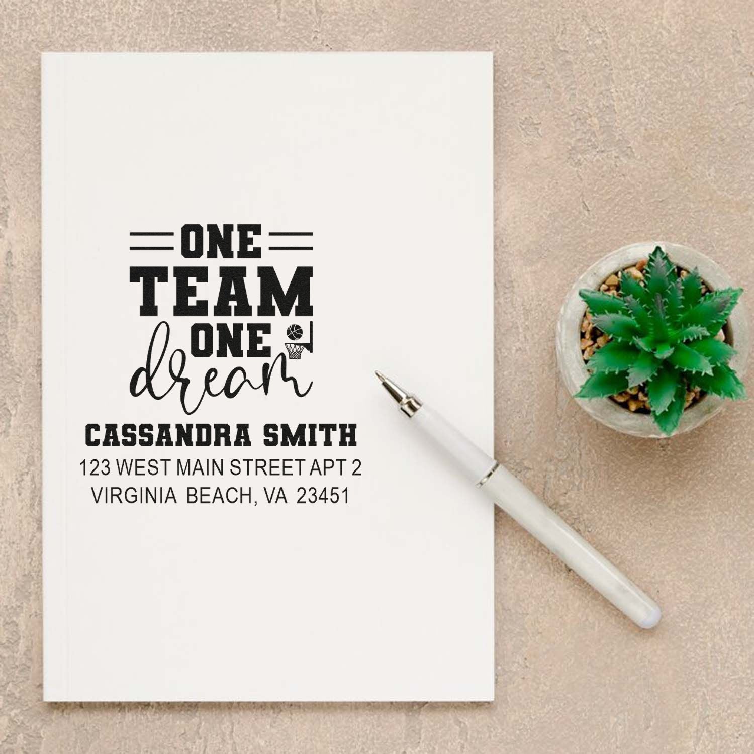 Personalized address rubber stamp with One Team One Dream basketball design for team mailings and custom stationery.