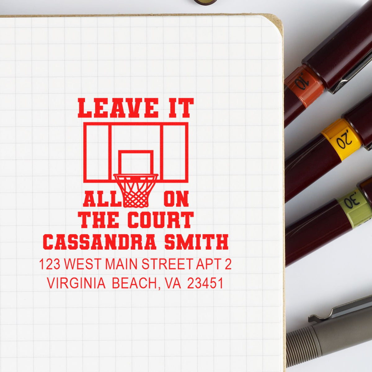Personalized basketball rubber stamp with Leave It All on the Court slogan, name, and address for custom sports stationery.