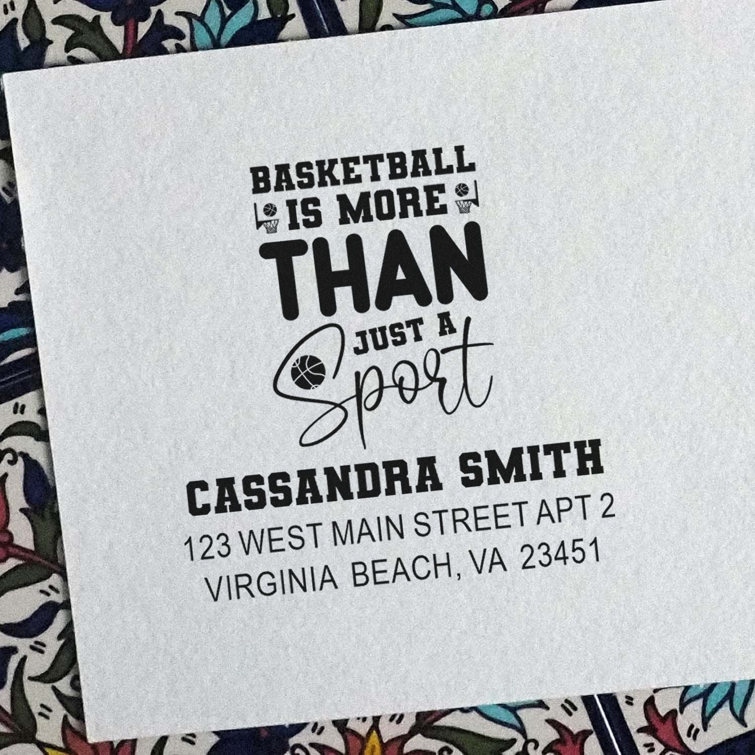 Custom basketball rubber stamp with Basketball Is More Than Just a Sport and return address for Cassandra Smith.