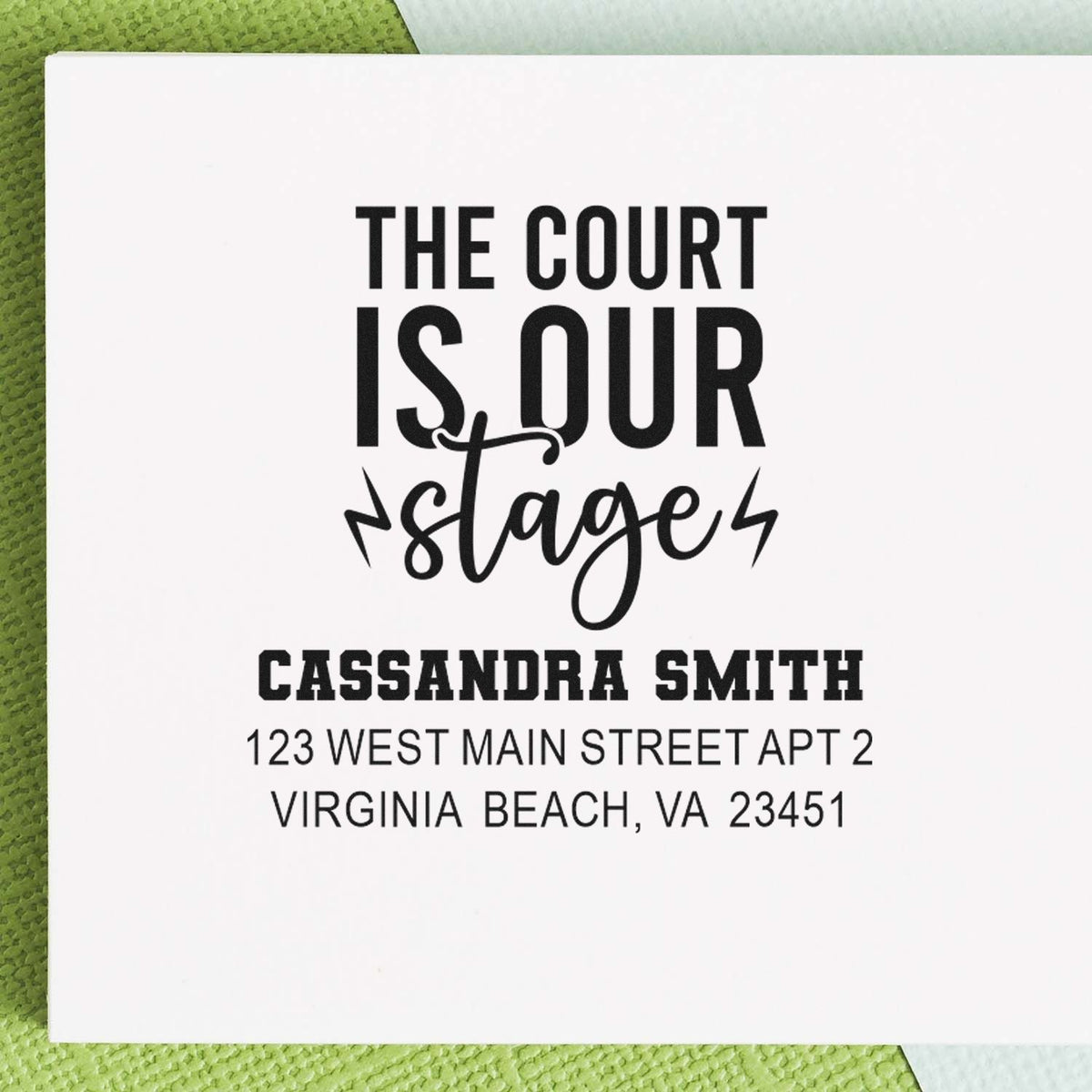 Custom rubber stamp with The Court Is Our Stage and Cassandra Smith return address, Virginia Beach, VA.