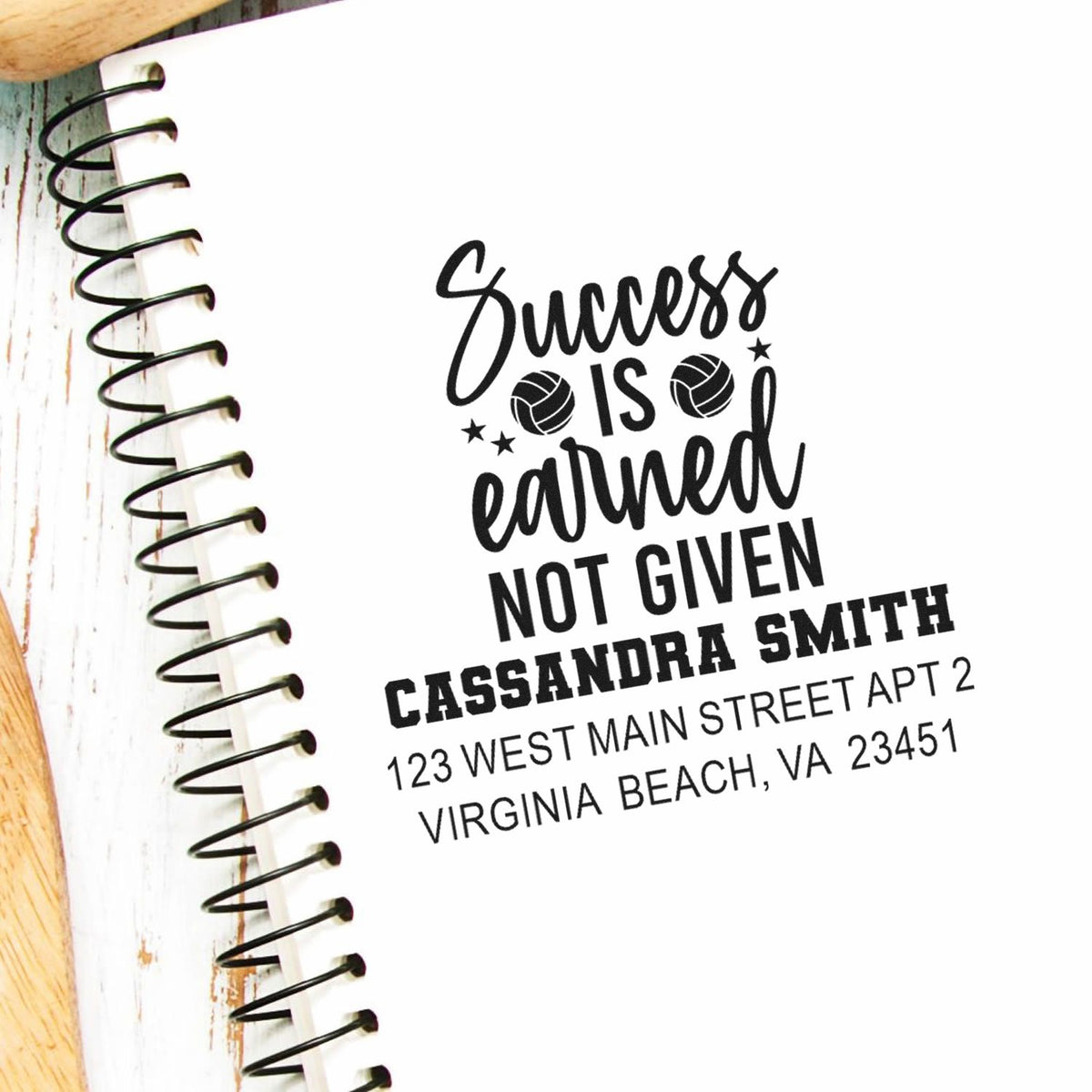 Motivational custom rubber address stamp with Success is earned not given design, name, street address, and Virginia Beach, VA.