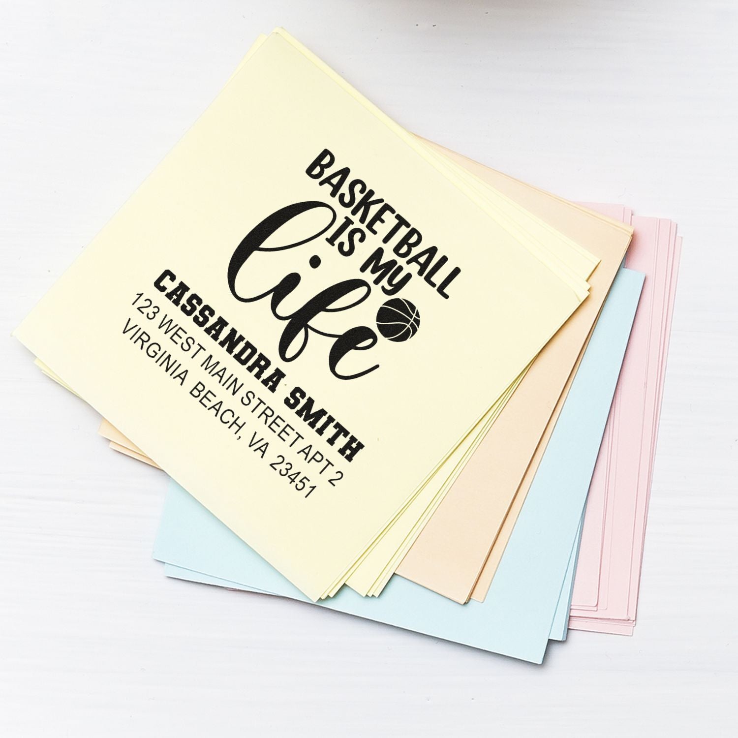 Custom basketball address rubber stamp on pastel envelopes, featuring Basketball Is My Life for personalized mail.