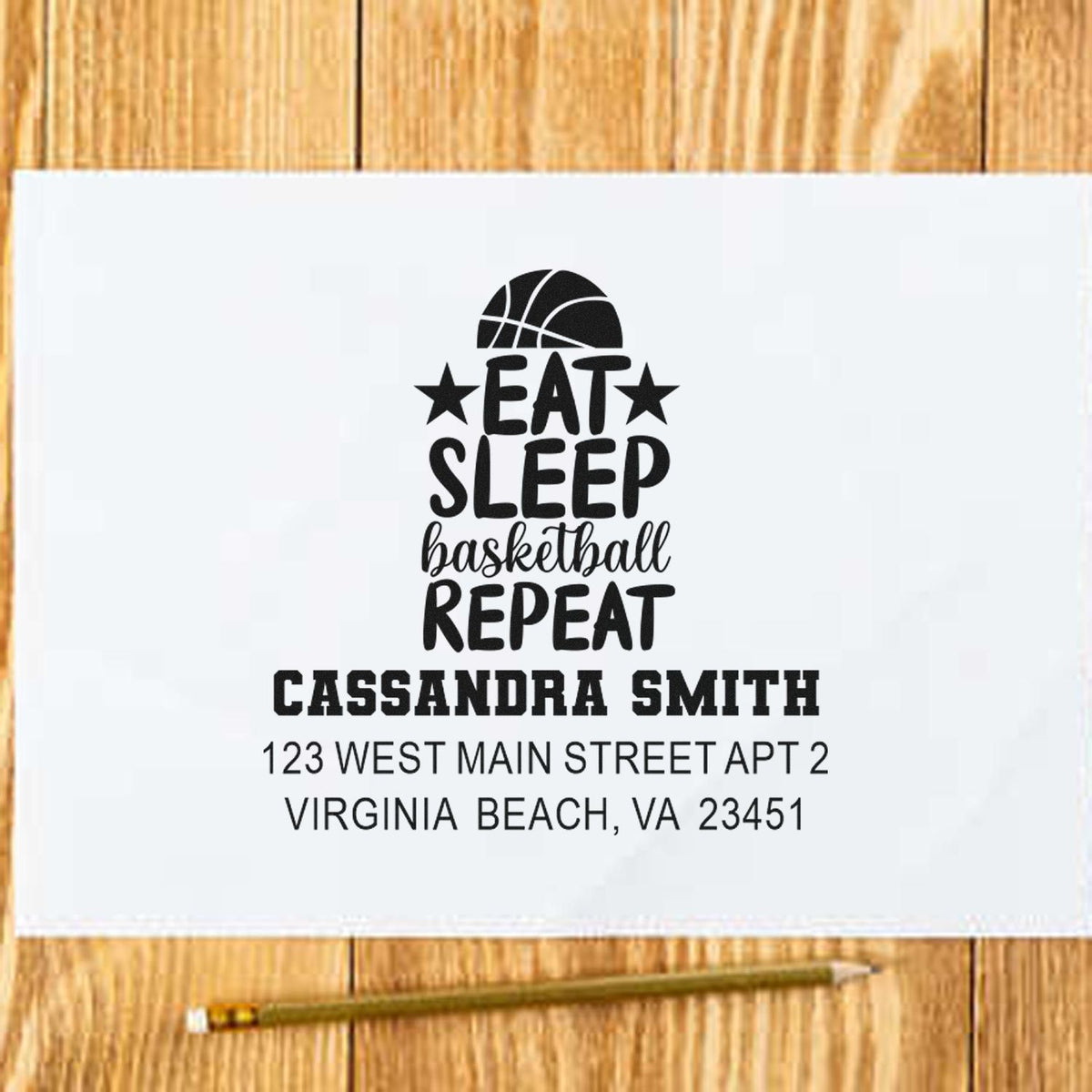 Personalized basketball address rubber stamp with Eat Sleep Basketball Repeat design, custom name, and return address.