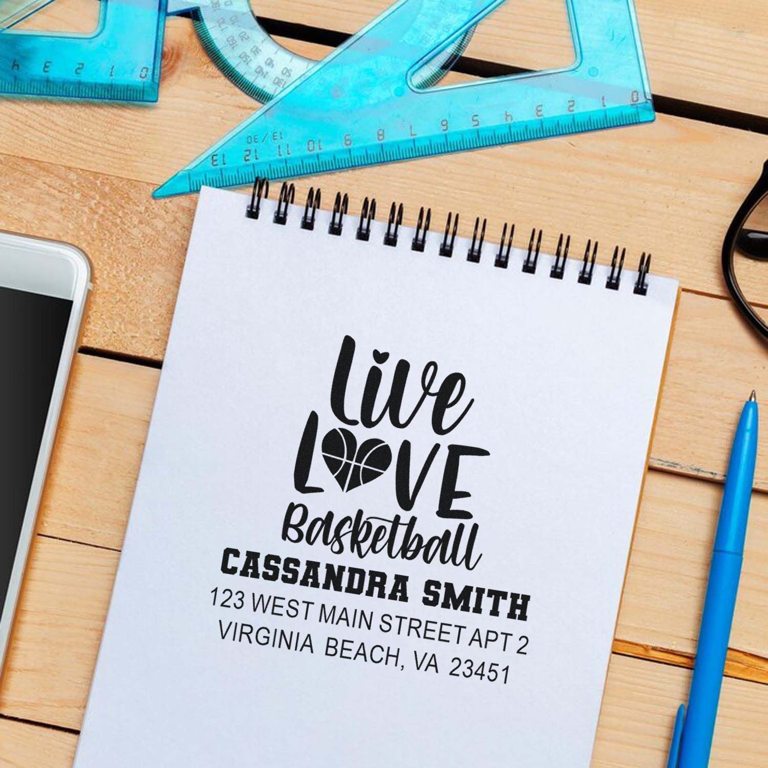 Custom basketball address rubber stamp with Live Love Basketball design for personalized mail and gift packaging.