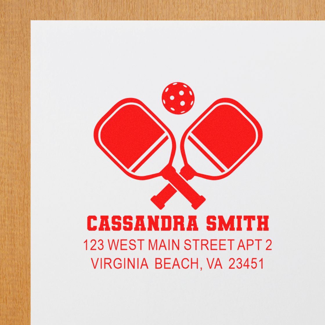 Personalized rubber address stamp with table tennis paddle logo for Cassandra Smith, Virginia Beach, VA.
