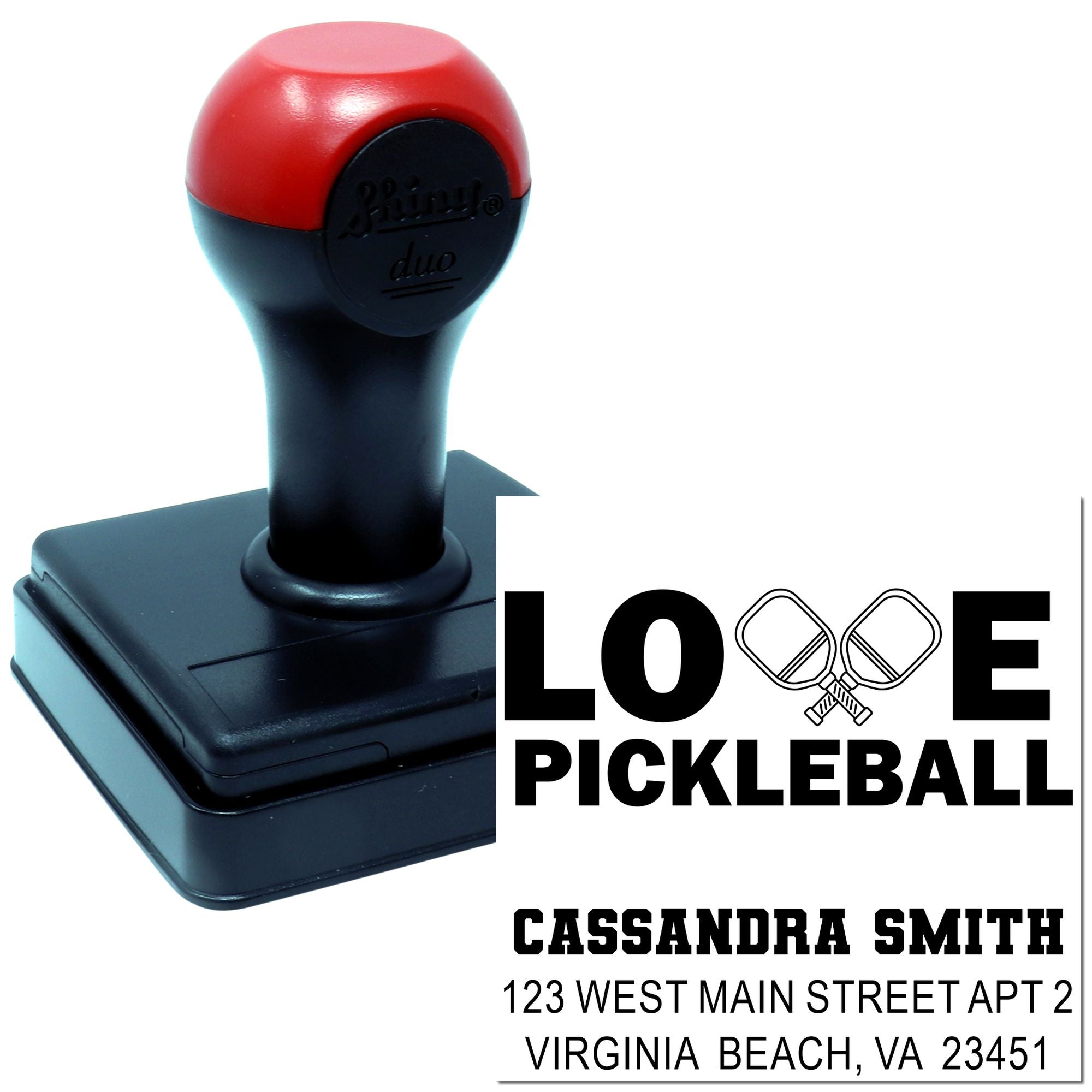 Custom self-inking rubber stamp for Love Pickleball, featuring crossed paddles, name, and address imprint.