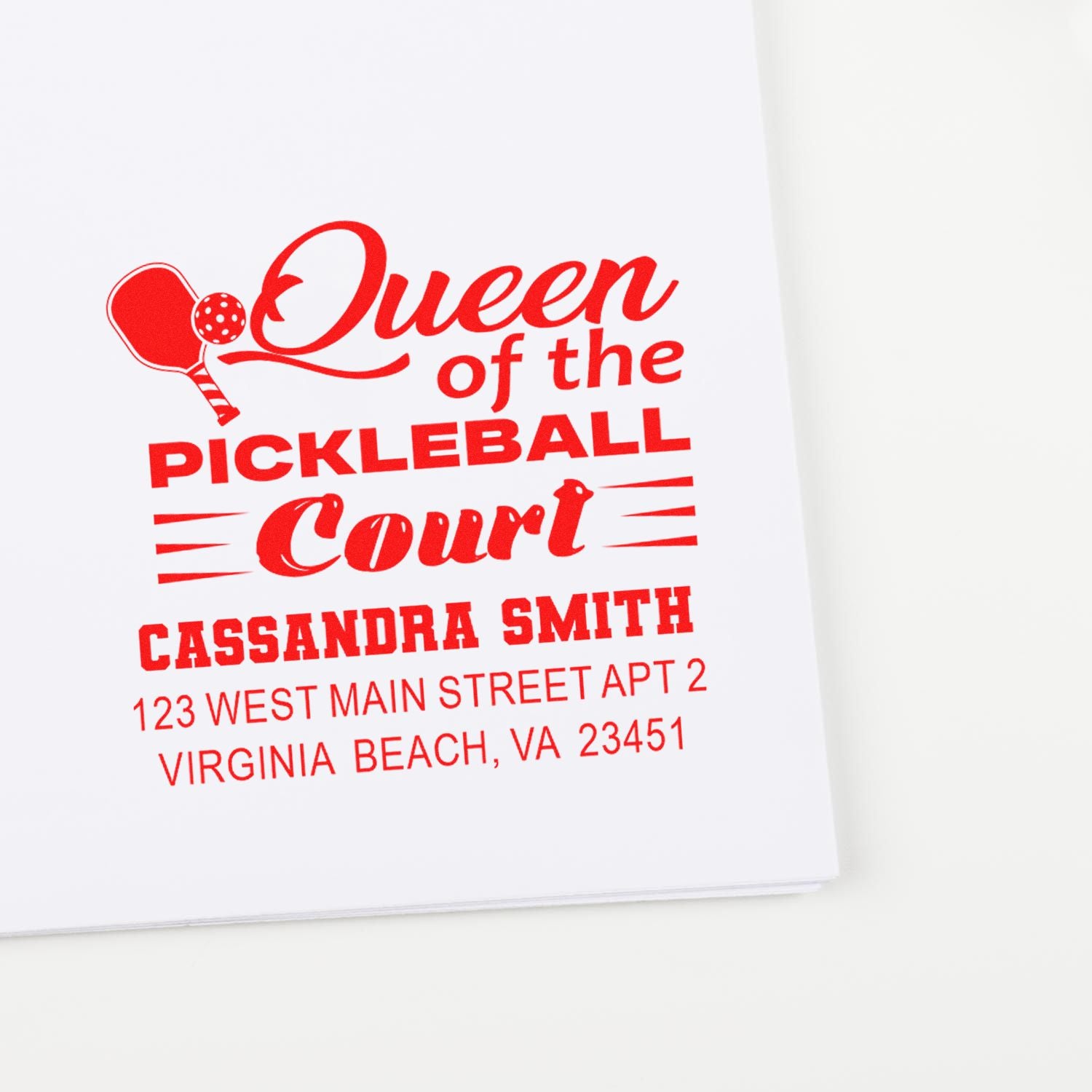 Custom pickleball rubber stamp reading Queen of the Pickleball Court with personalized name and address.