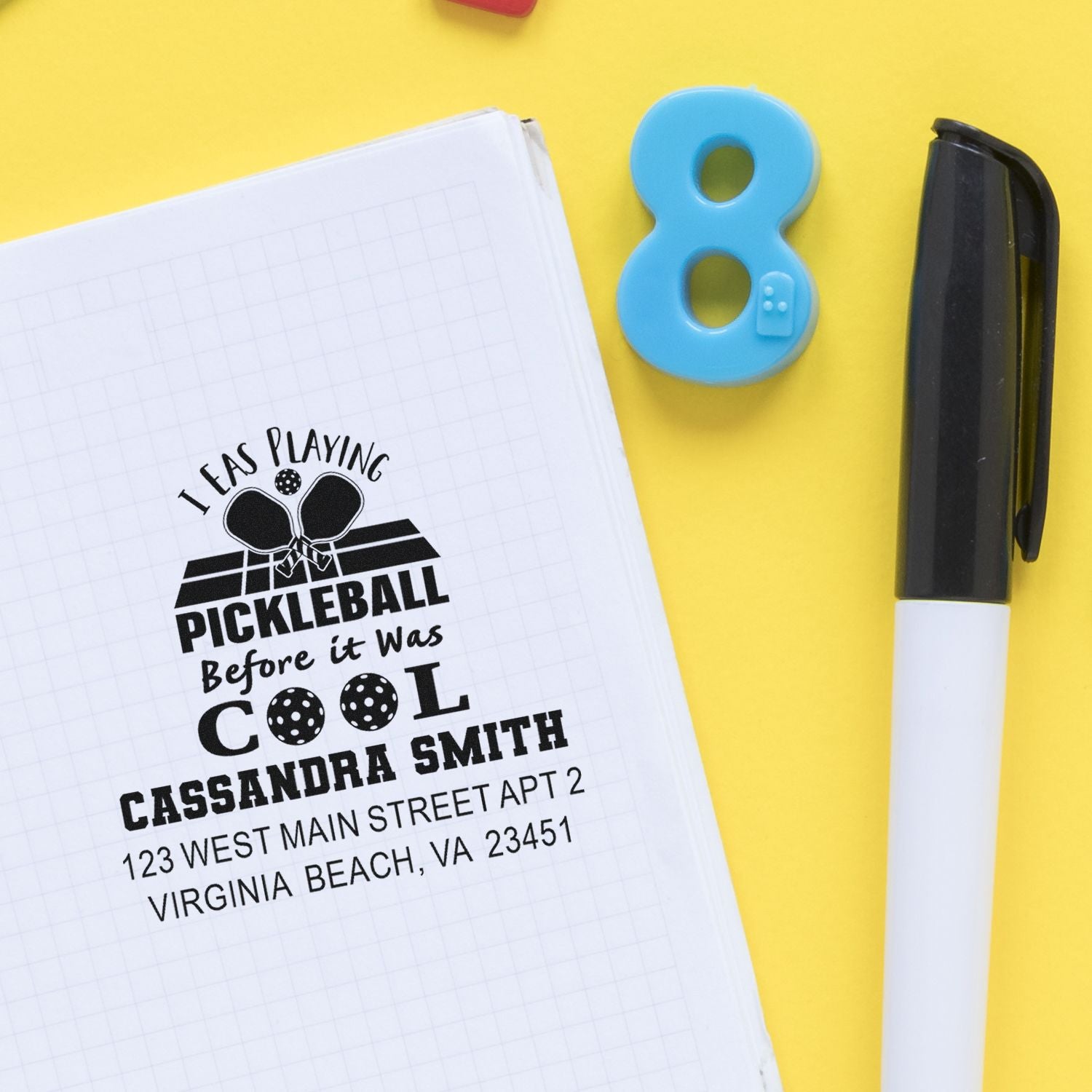 Self-inking rubber stamp impression for pickleball fans with custom name, quote, and return address.