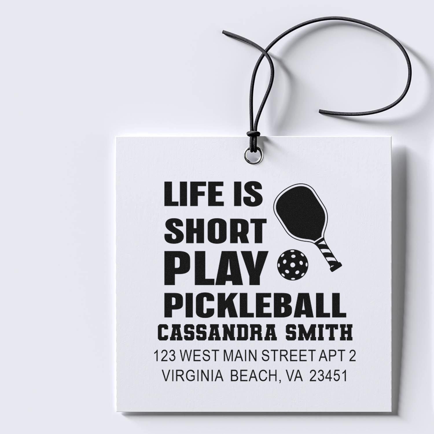 Personalized pickleball rubber stamp design with custom name and address, featuring Life is short play pickleball slogan.