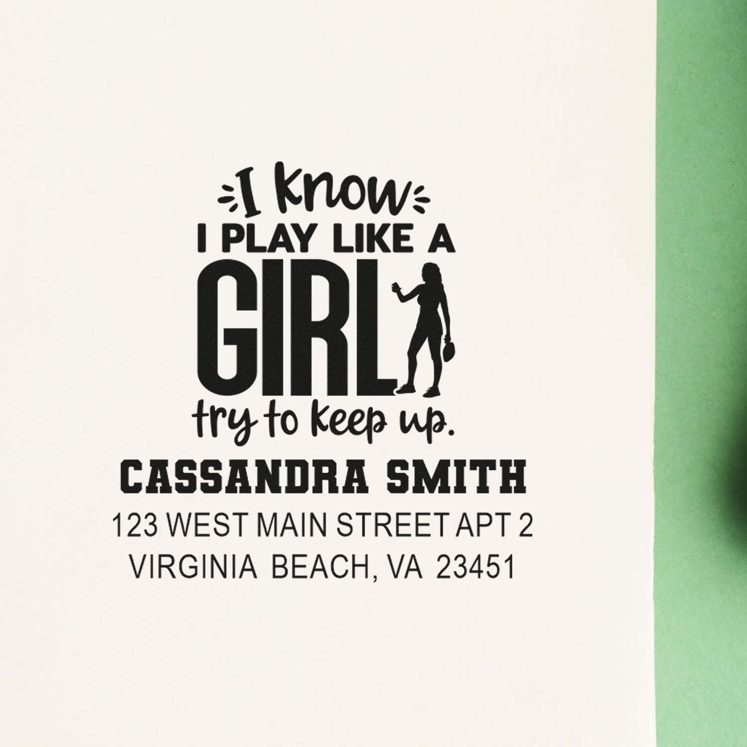 Custom rubber stamp impression with I know I play like a girl design, personalized name and return address for mailing.