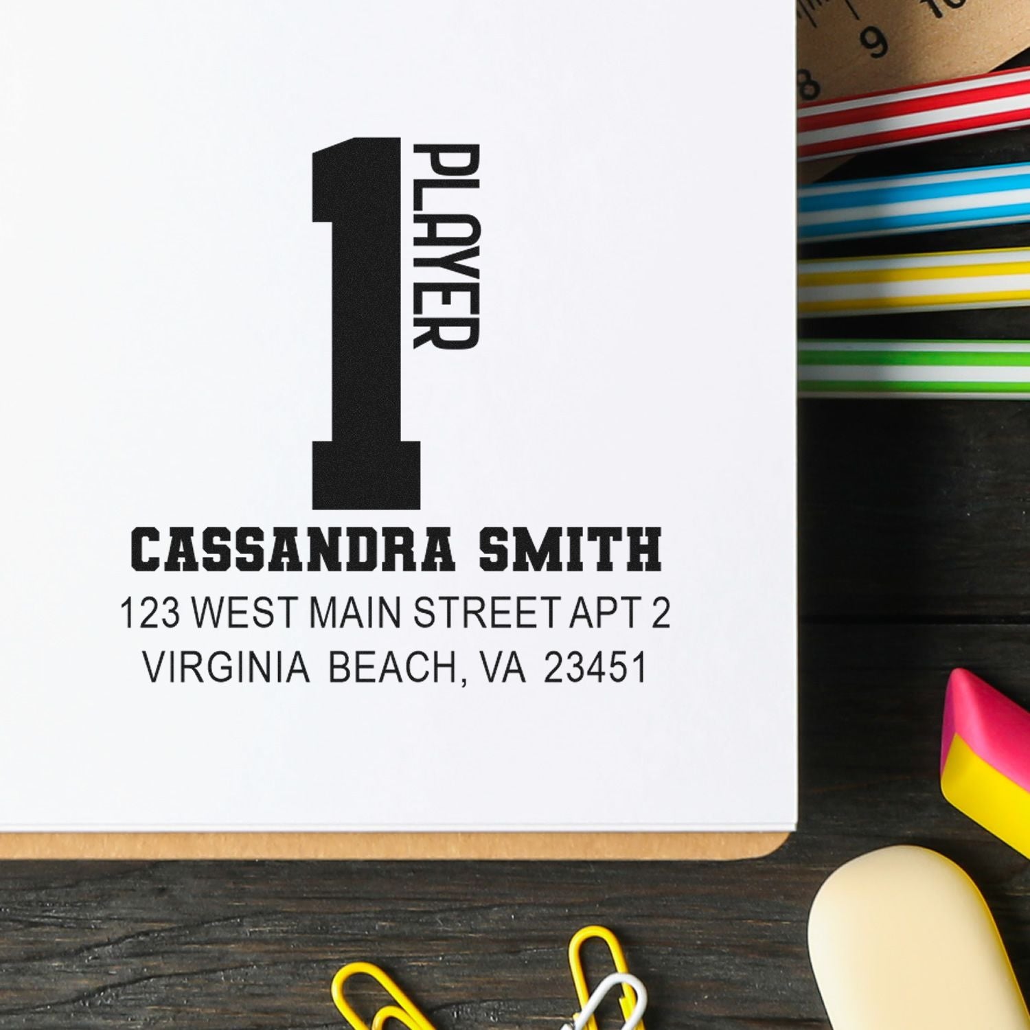 Custom rubber address stamp with 1 Player design for personalized mailing and branding.