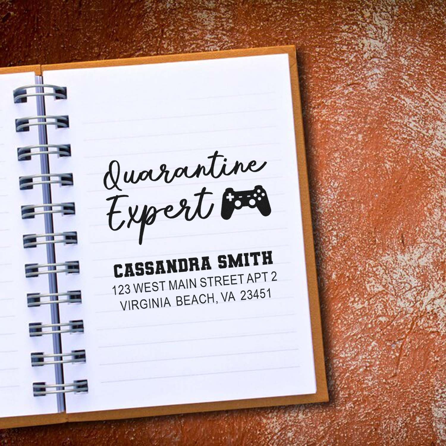Custom rubber stamp impression reading Quarantine Expert with name and address for personalized stationery.