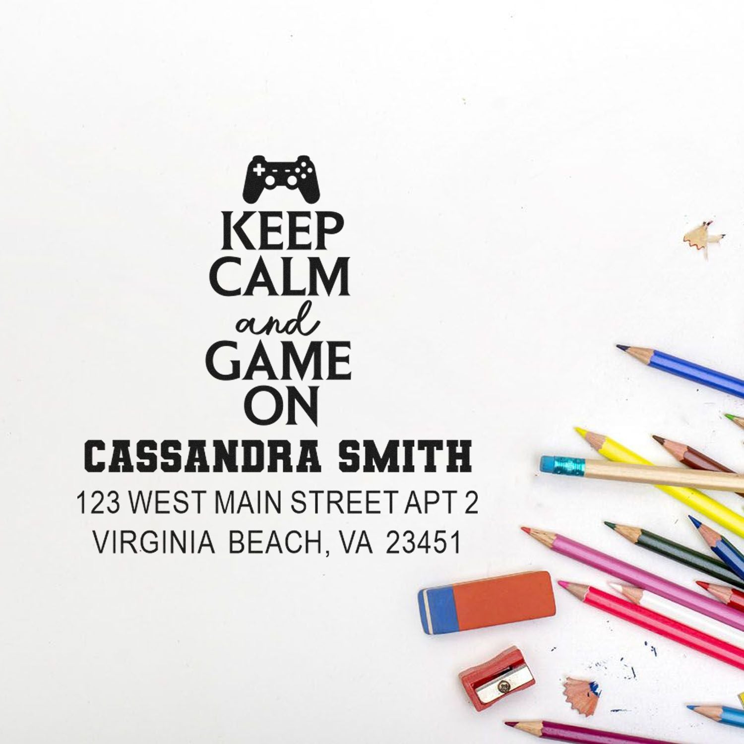 Custom rubber stamp with game controller icon and Keep Calm and Game On text for Cassandra Smith address labels.