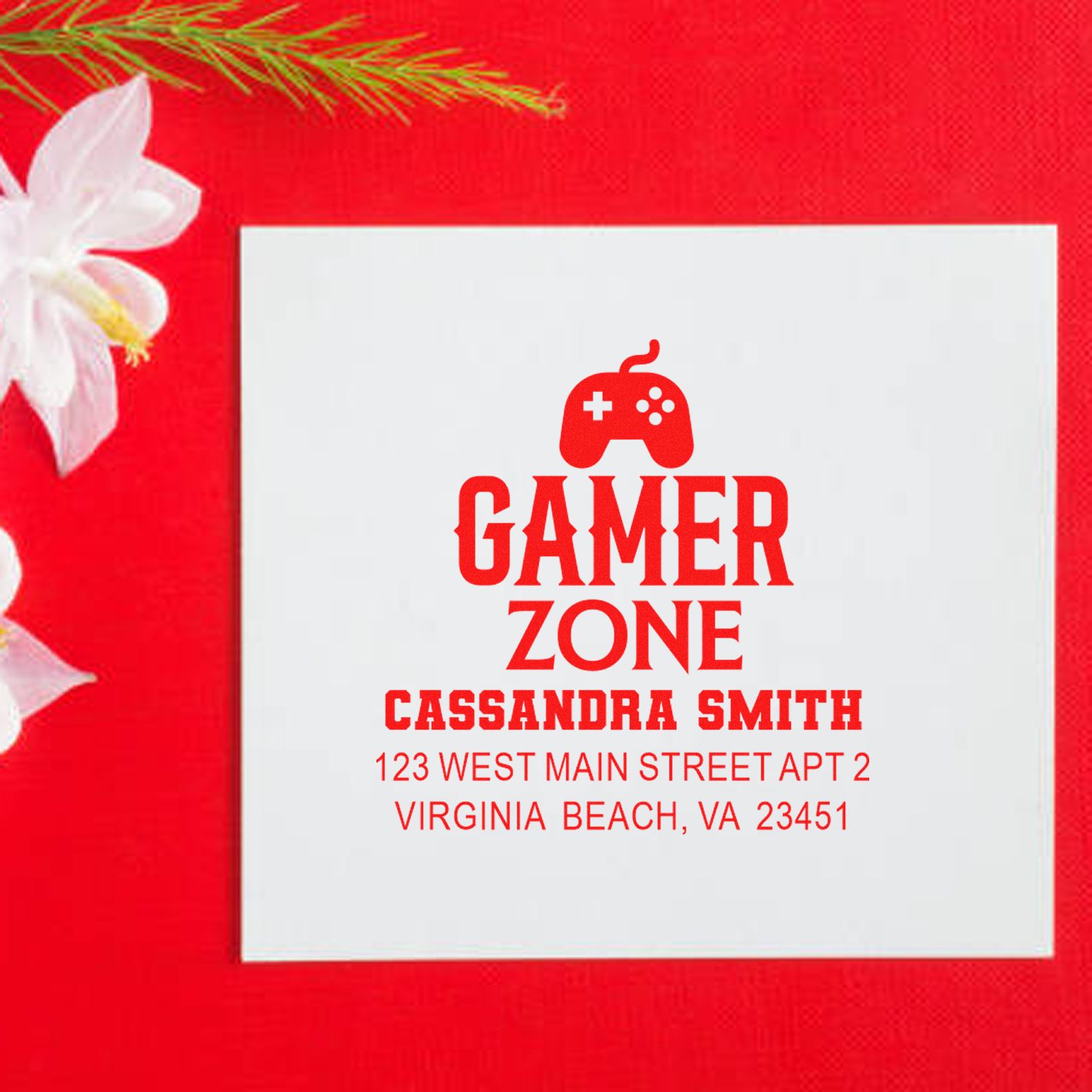 Custom gamer zone rubber stamp with controller icon, name Cassandra Smith, and Virginia Beach address.