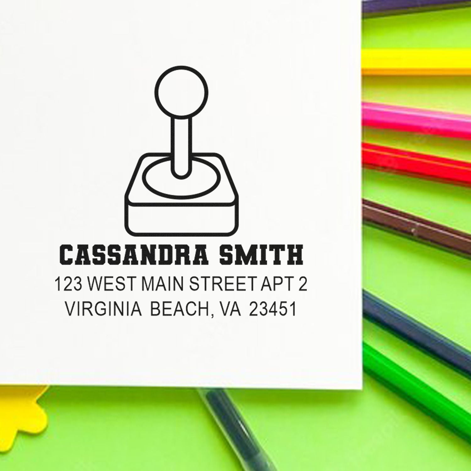 Custom self-inking address rubber stamp with name and Virginia Beach return address for mailing envelopes and cards.