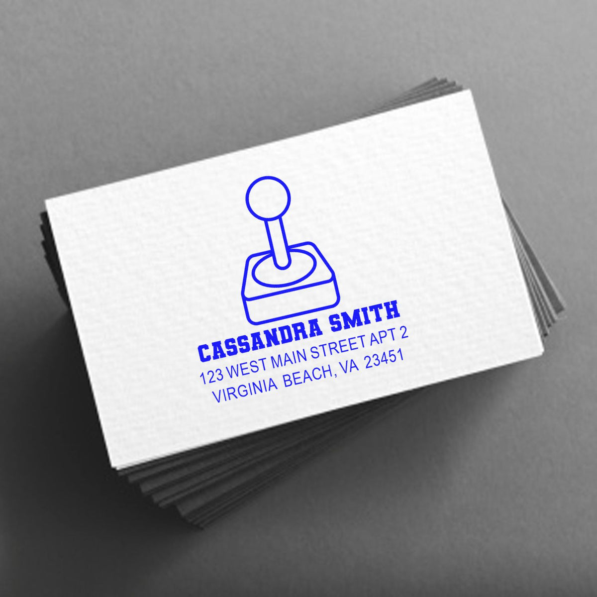 Personalized rubber address stamp for business cards with name, logo, and Virginia Beach mailing address.