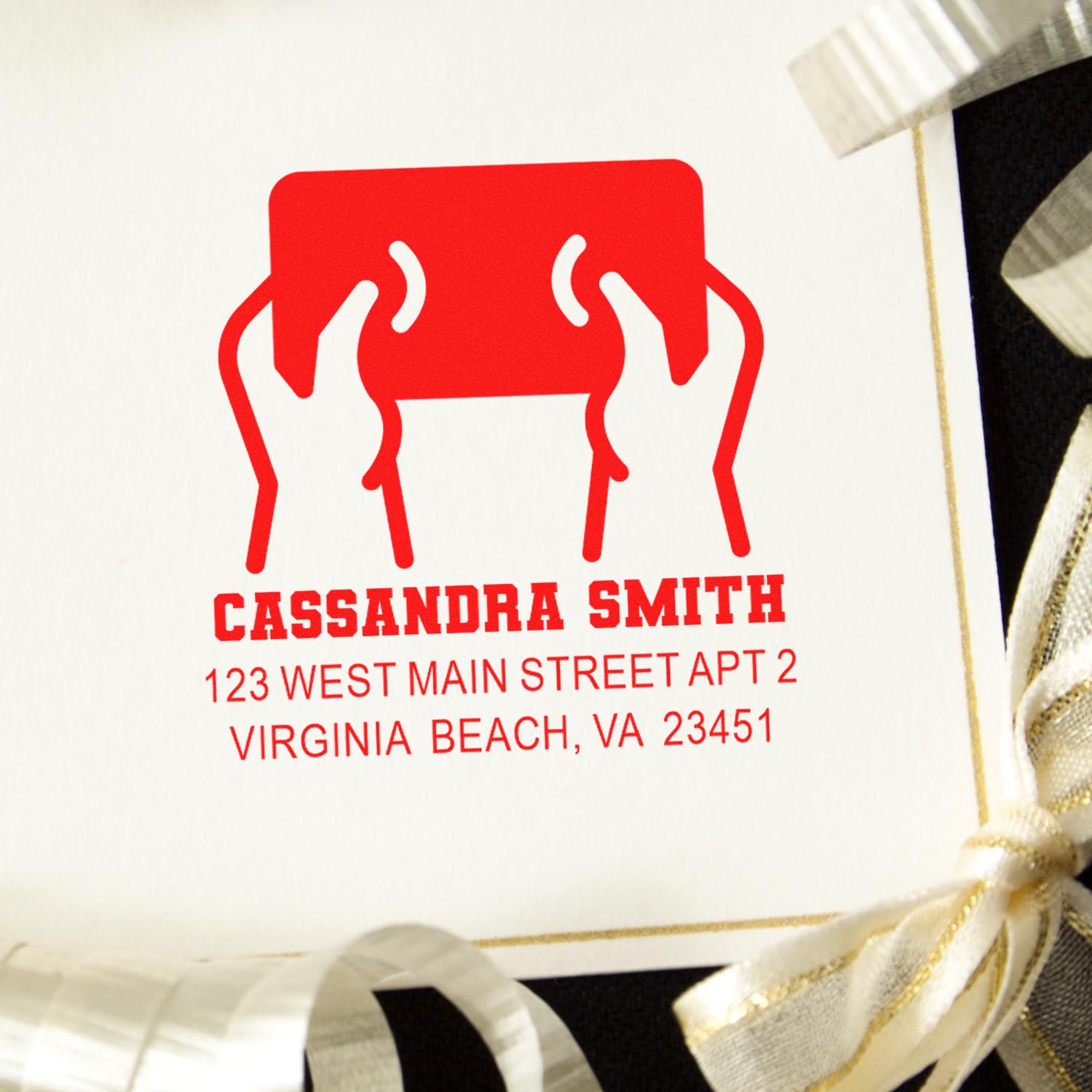 Custom return address rubber stamp for envelopes, featuring Cassandra Smith and a Virginia Beach, VA mailing address.