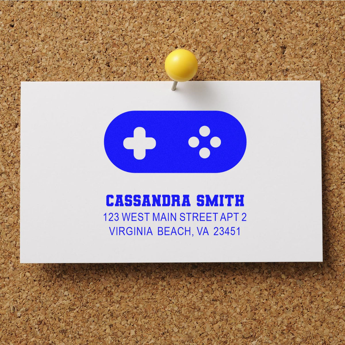 Custom return address rubber stamp design for Cassandra Smith, featuring a gaming controller icon and Virginia Beach address.