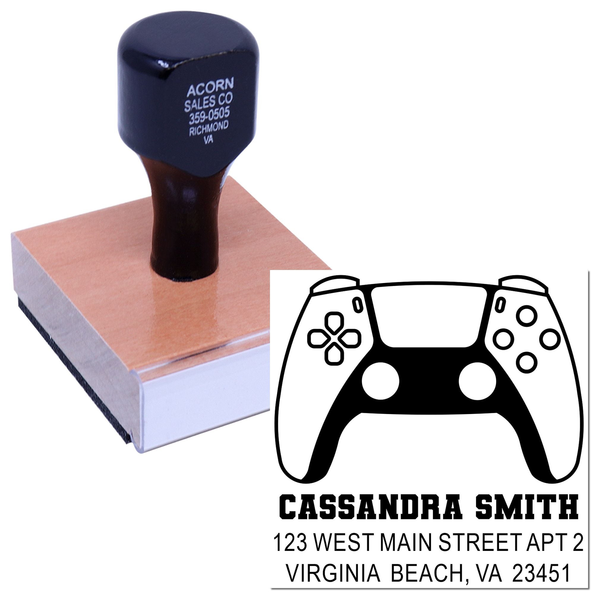 Custom rubber address stamp with gaming controller design, showing personalized self-inking name and address imprint.