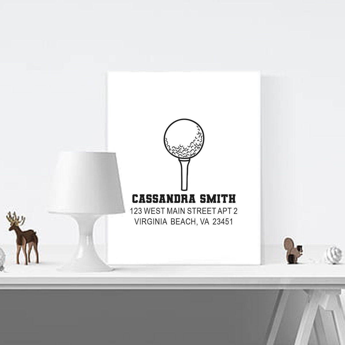 Custom golf rubber stamp with personalized name and address, featuring a golf ball design for envelopes and stationery.